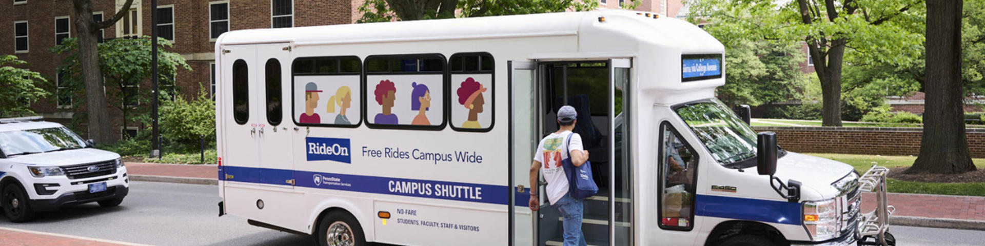 Rider getting on the Campus Shuttle