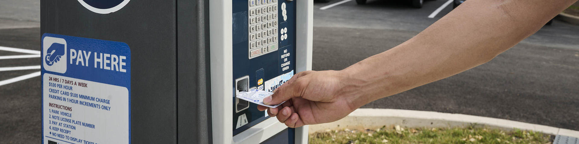 Visitor using a pay station